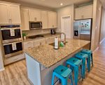 Kitchen w Granite Countertops and New Stainless Steel Appliances is Equipped with Plates, Silverware, Glasses, Pots and Pans, Baking Utensils and Much More